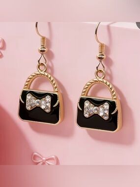 Elegant Black Bow Purse Earrings with Gold Accents